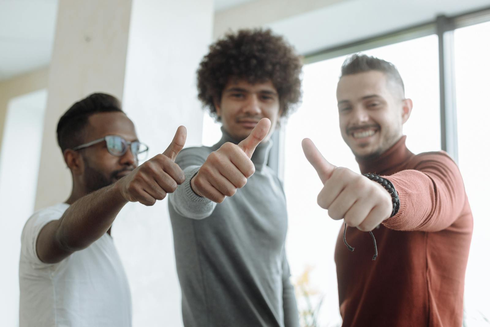 A group giving a thumbs-up